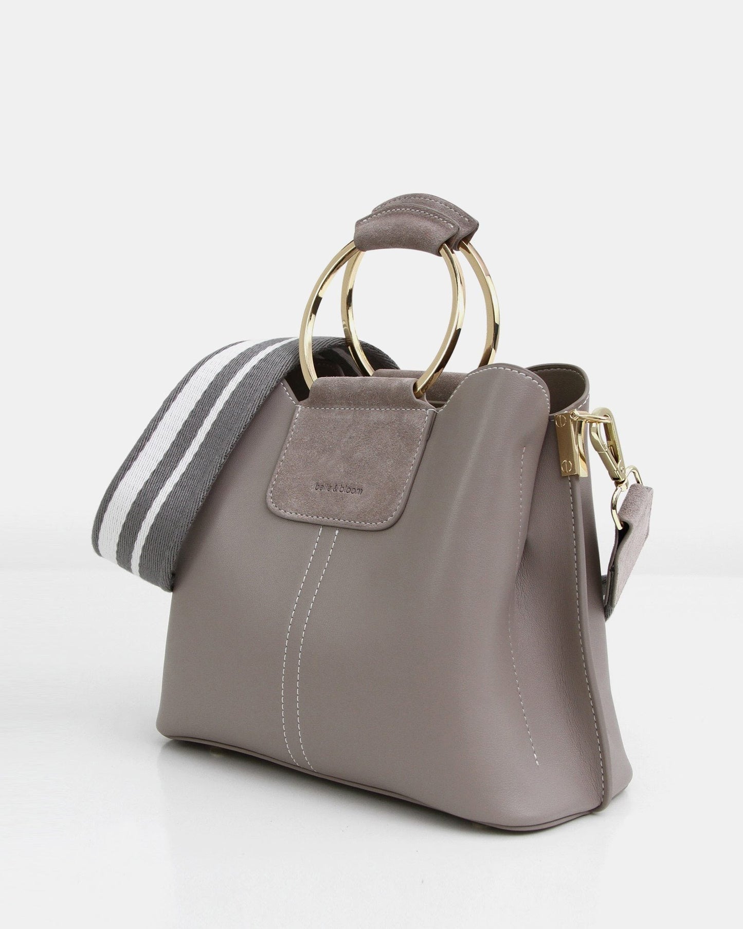 Close-up-of-taupe-leather-handbag_d5f00b5d-50ec-4ed6-8252-3b01d65dcd59.jpg