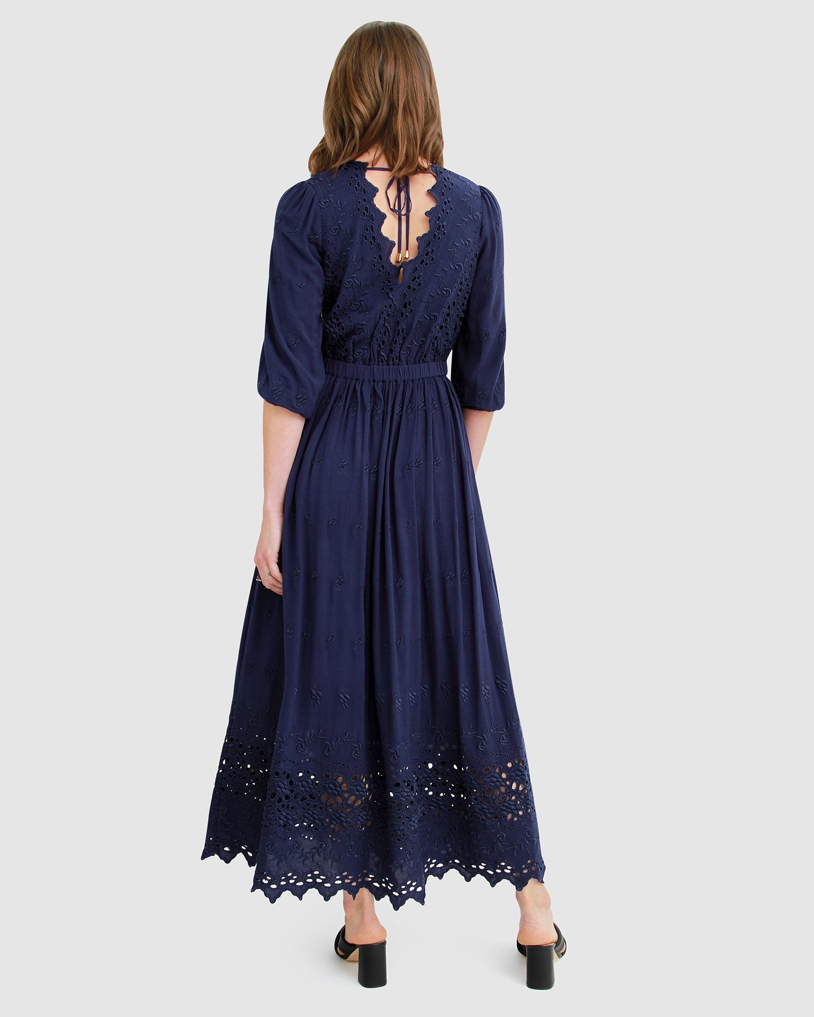 all-eyes-on-me-navy-eyelet-midi-dress-back_68749ac6-4423-442e-b0a1-4a0099dea601.jpg