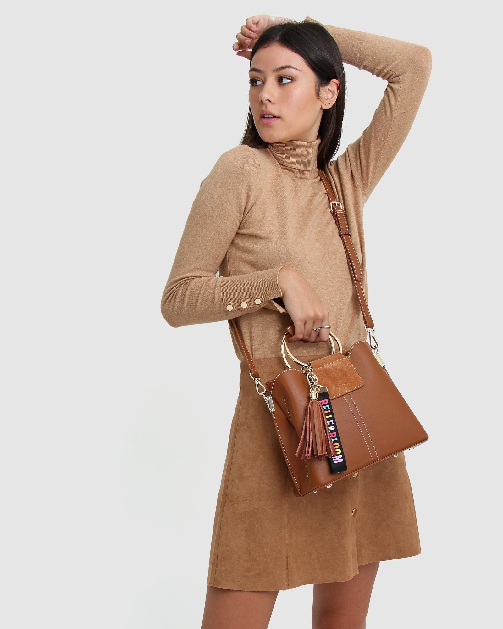 brown-handbag-with-branded-keychain_36ea8cae-56ca-4c35-8cbf-09af9d3cf4d1.jpg