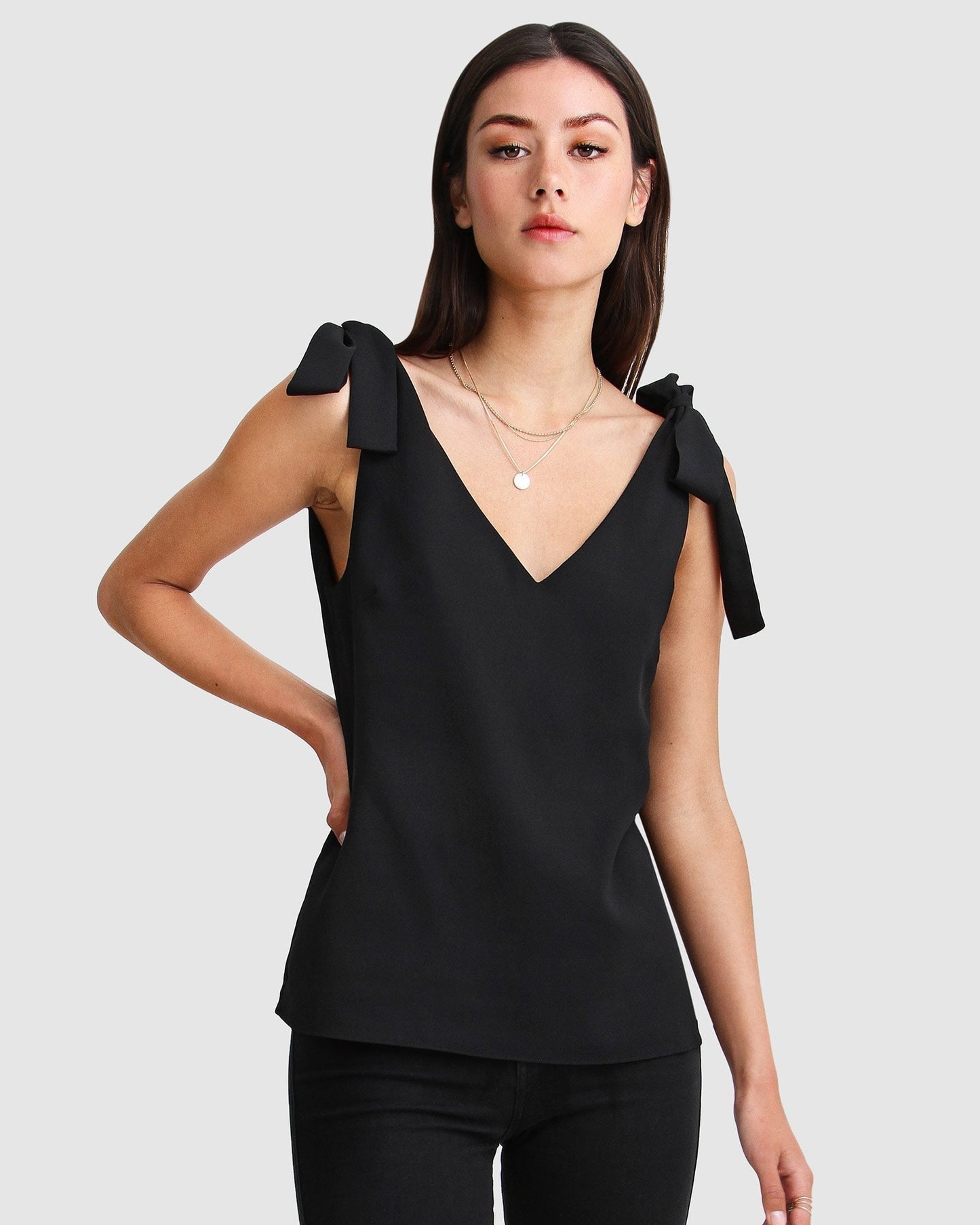 feel-for-you-V-neck-top-black-front-untucked_ceb7b6ff-6e9d-4752-8674-a3d72c171f8c.jpg